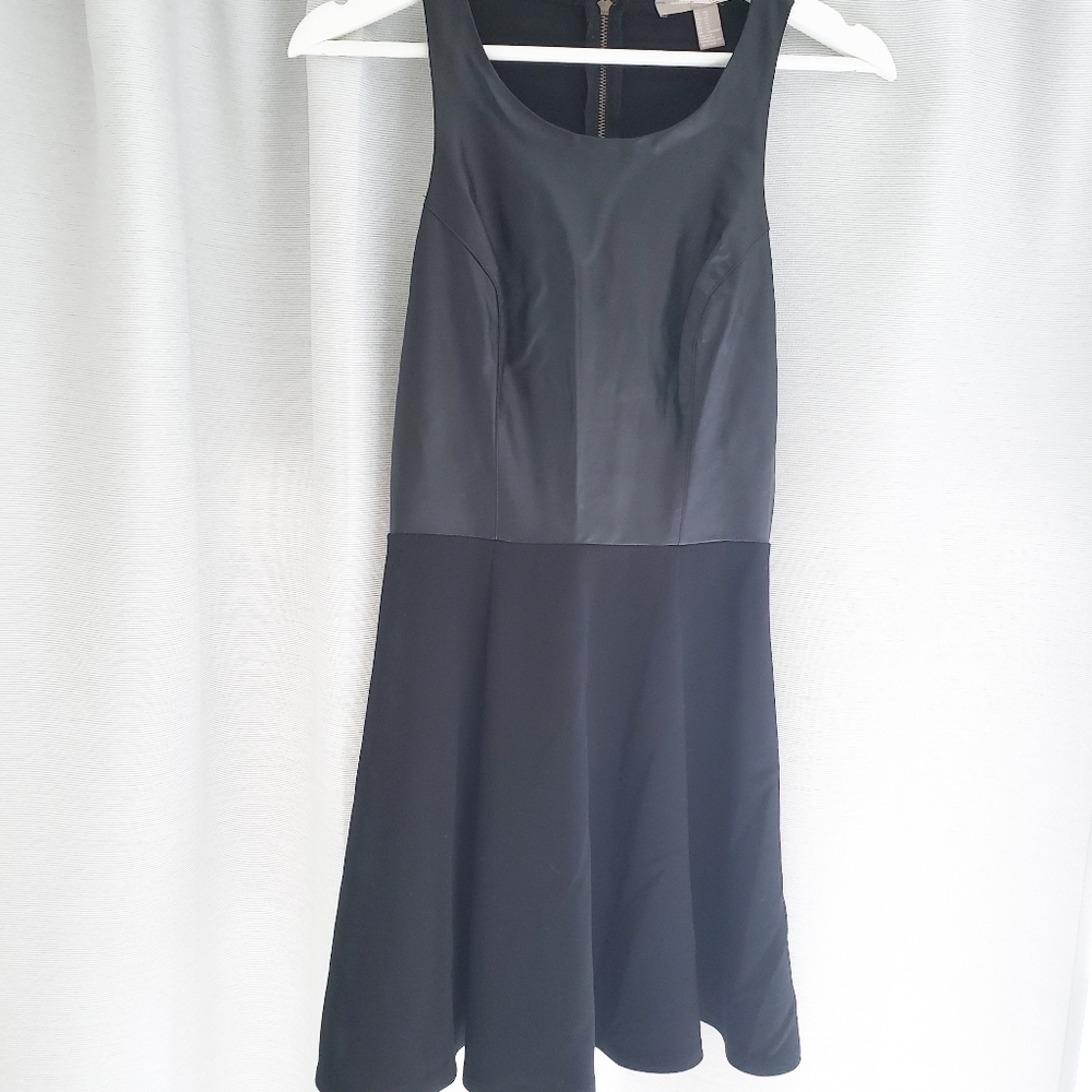 Black dress with leather top.